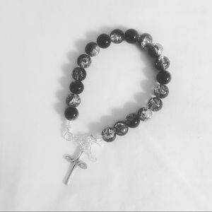 Black and white cross charm bracelet.